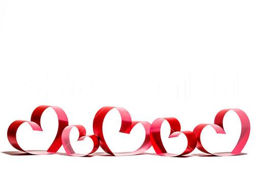 Ribbons Shaped As Hearts On White
